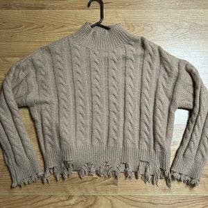 Distressed sweater